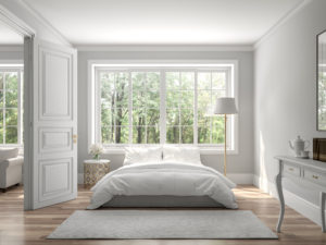 Classical bedroom and living room 3d render, The rooms have wooden floors and gray walls ,decorate with white and gold furniture, There are large vinyl windows looking out to the nature view.